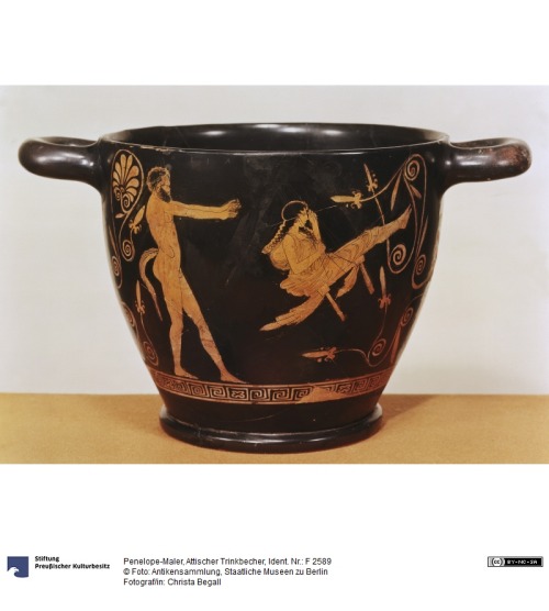 Attic wine cup with an image depicting Satyr and an young girl in a swing* 5th century BCE* Chiusi* 