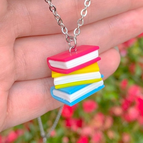 justlgbtthings:sosuperawesome:Pride Book Stack Jewelry and KeychainsShiny Stuff Creations on Etsy i