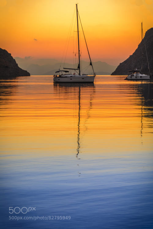 A New DaySunrise at Pedi beach, Symi island, Greece. Photo by Panagiotis Laoudikos. 