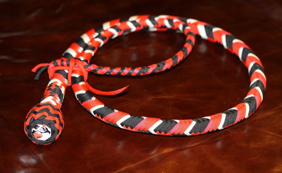 bdsmgeek:  edgeplay-co-uk:  Harley Quinn themed whip and flogger. Only one of each
