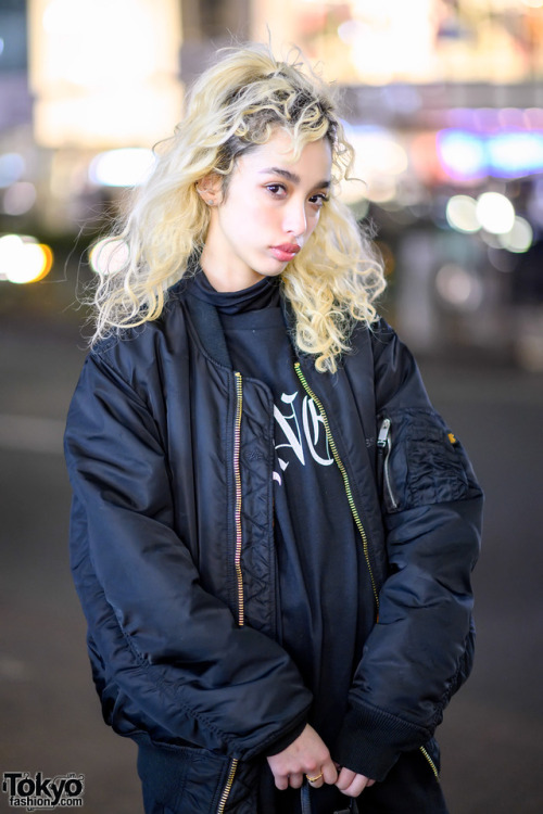 20-year-old Bibi on the street in Harajuku wearing an Alyx bomber jacket over a Vyner Articles dress