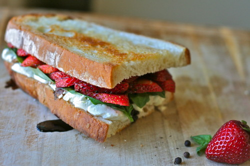 wisconsincheese:  A fresh, decadent sandwich perfect for dinner on the porch or wrapped up in a picnic basket. Creamy but light Wisconsin feta is accentuated by the contrasting sweetness of strawberries and aged balsamic, fresh basil leaves, and a hint