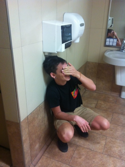cumslayer:  twink gets blown in Walmart washroom