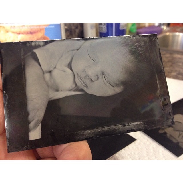 First tintype of Luis. Fittingly photographed with a “baby 2x3 crown graphic” camera. #portrait #baby #tintype #wetplate #collodion #newborn #viewcamera #2x3