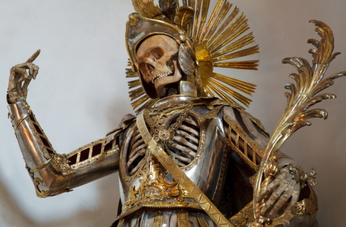 St. Pancratius (Wil, Switzlerand) “He wears armor because he was believed to have been an Early Christian soldier who was martyred. The current suit of armor was made by a silversmith in Augsburg, Germany, in the 18th century. The skeleton was vandalized