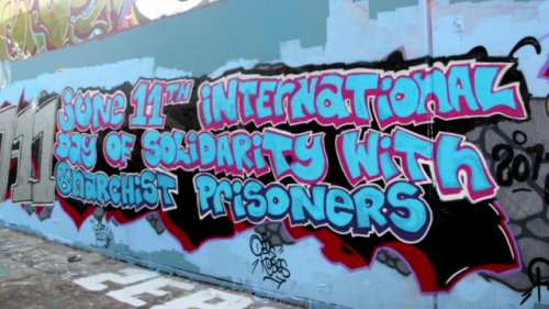 Solidarity graffiti for June 11, International day of solidarity with anarchist prisoners