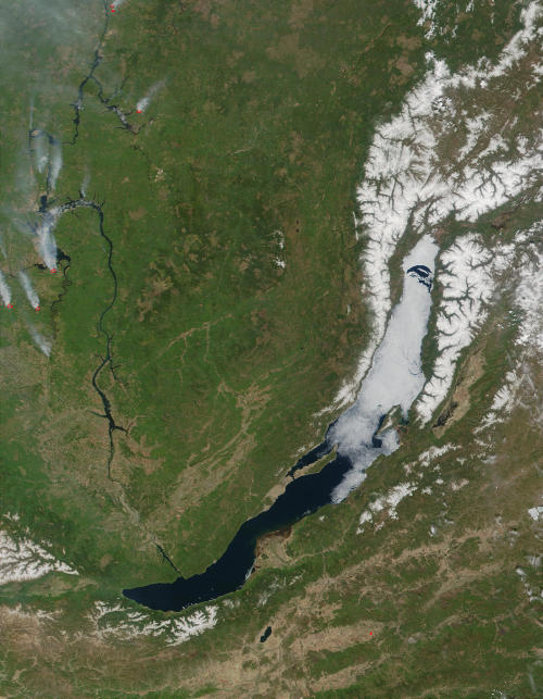 Ice retreats from the south-western corner of Lake Baikal in Russia(May 29th, 2001).  The Angara Riv