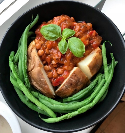 thefoodarchivist:Hers: jacket potato with mixed beans in a spicy marinara sauce