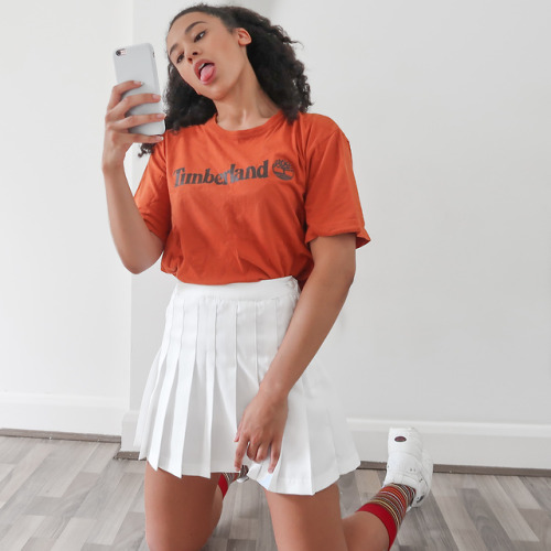 Code: LDNTMB // £12 // vintage #timberland tshirt in orange cut into a crop, perfect for summer/autu