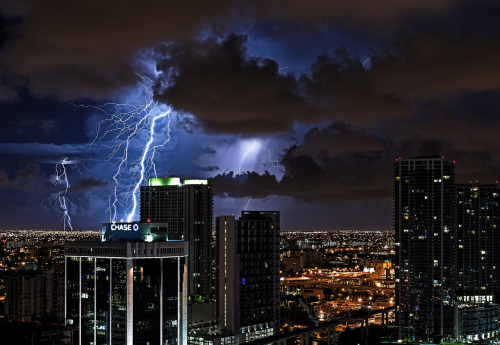 awkwardsituationist:  lightning over the skies of miami photographed by lostINmia from his apartment 