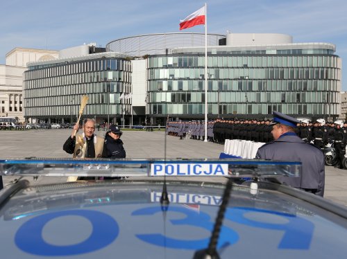 Polish priest blessing new police cars. Warsaw, 2015.