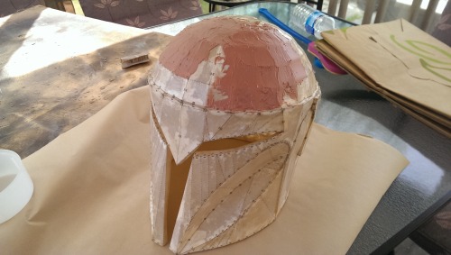Did the Resin and Fiberglass work on my Mando helmet finally, started some bondo on the top and then