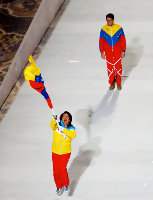 olympicsusa:  Skier Antonio Pardo of the Venezuela Olympic team carries his country’s flag during the Opening Ceremony of the Sochi 2014 Winter Olympics Source: Bruce Bennett 