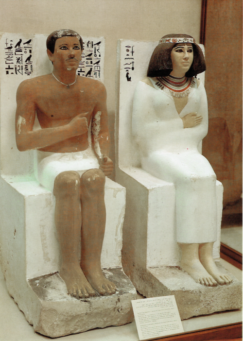 Painted life-sized seated statues of Prince Rahotep (son of King Sneferu) &amp; his wife NofretOld K
