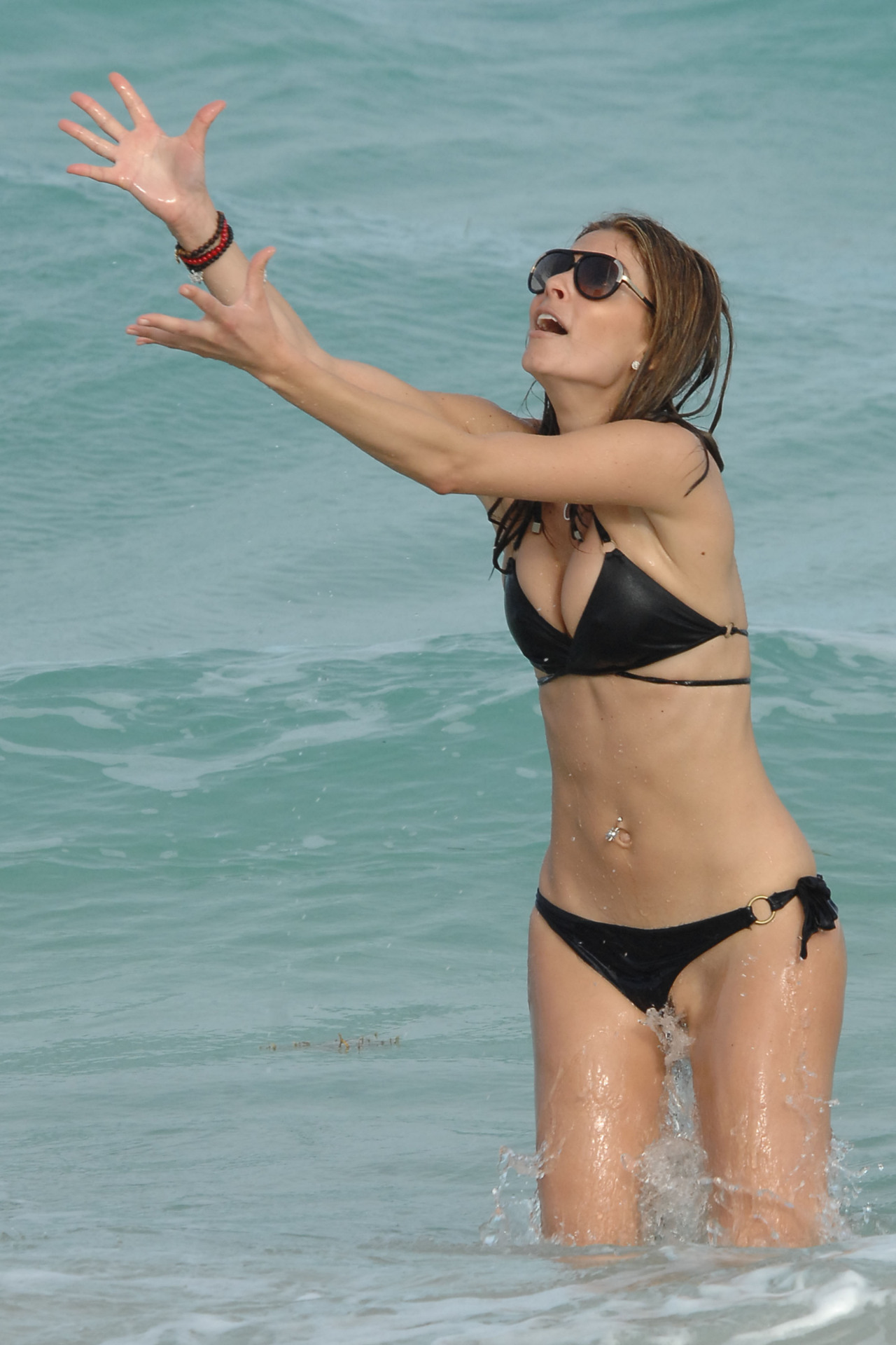 toplessbeachcelebs:  Maria Menounos (TV Presenter) bikini slip in Miami (December