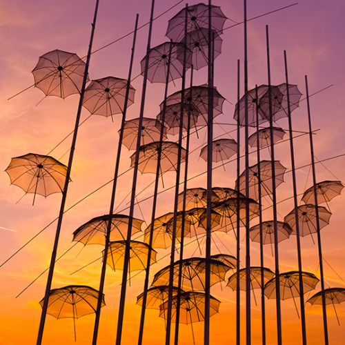 Umbrellas, by George ZongolopoulosCatch colourful sunsets over Thessaloniki’s new promenade through 