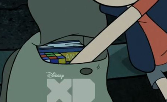 starfleetrambo:  So I was kinda curious what was inside Dipper’s bag so I went back to take a look..  Okay.. so there’s something like an almanac of some sort..? (god what a nerd) and a.. Wait a minute. Now where have I seen that rubik’s cube