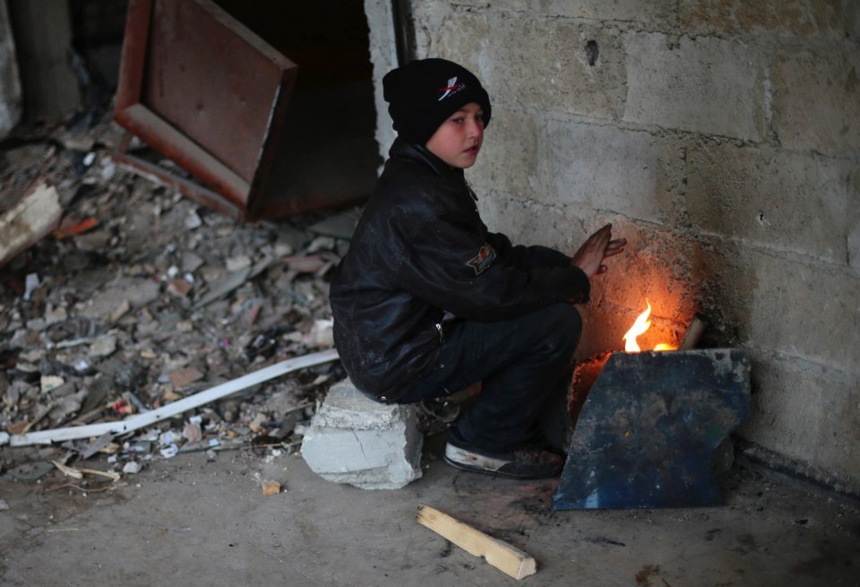 fotojournalismus:  Syria 2014 1. Deir al-Zor, Feb. 3. (Khalil Ashawi/Reuters) 2.