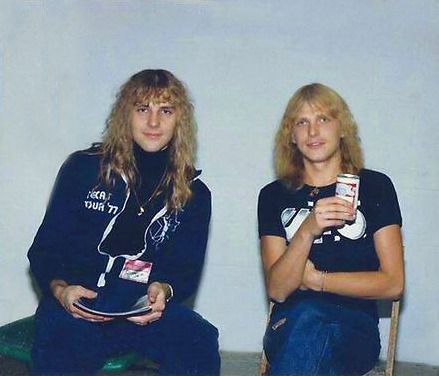 Alex Lifeson (Rush) and Michael Schenker (UFO) backstage US tour 1977.They look like brothers!