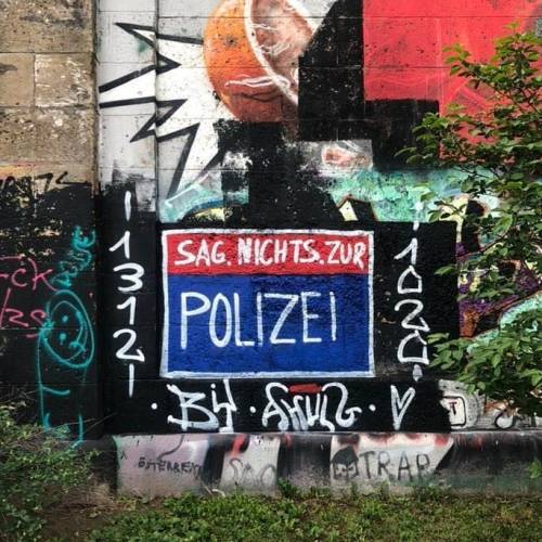 “Don’t say anything to the police” Seen along the canal in Vienna, Austria