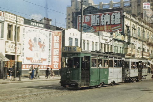 sixthland:Colour Photos of Daily Life in Shanghai between 1945 - 1946Note the WWII victory billboard