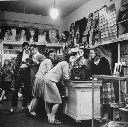 loveyourlibrary:  Teenagers browsing a record store, 1944.