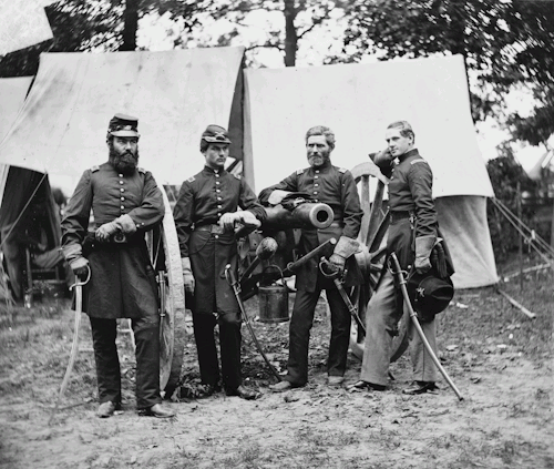 A group of Union officers including Captain James Robertson (third from left) posing with a cannon in camp at Fair Oaks, Virginia, 1862. By James F. Gibson. Animated stereoscopic photographs.
Source.