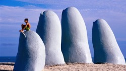 bojrk:  Uruguay: “The Hand” sculpture that rises out of the sand of the beach in Punta del Este 