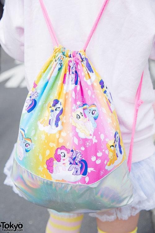 tokyo-fashion:  Maro on the street in Harajuku wearing a pastel look that features a Manamoko sweatshirt, My Little Pony sackpack, loose socks, and accessories from 6%DOKIDOKI and SPANK!. Full Look 