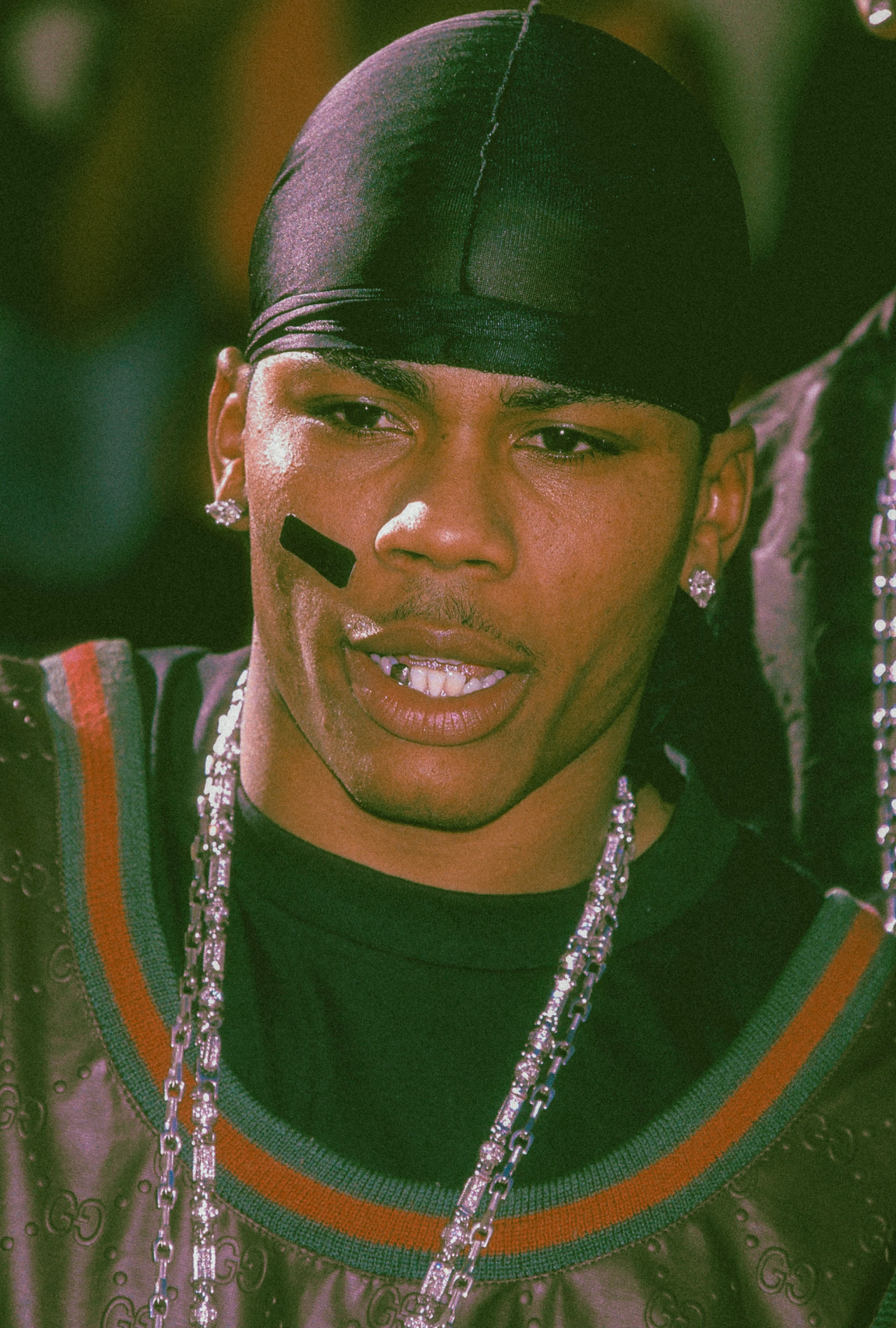 Nelly photographed by Gregg DeGuire while... - Strapped Archives