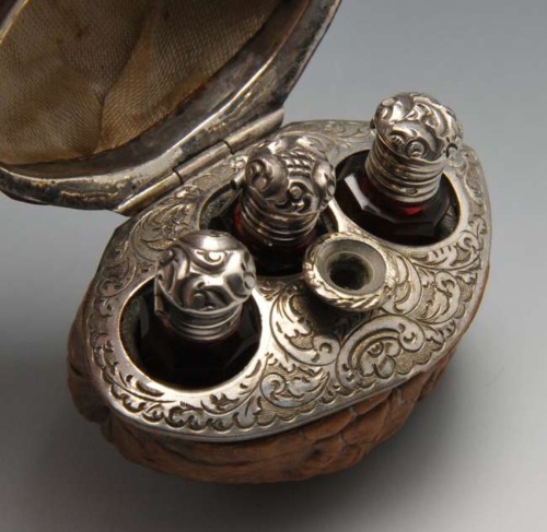 disgustinghuman: 19th century French hinged walnut case with scent bottles &amp; funnel I’