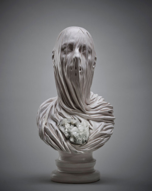 asylum-art:  The Veiled Ghosts of  Livio Scarpella The work of Italian contemporary artist Livio Scarpella turns good and evil into delicacy.  This group of sculptures, named “Ghosts Underground”, depicts lost souls anguishing beneath the effect