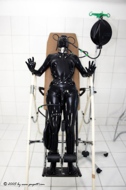 rubberdollowner:  http://rubberdollowner.tumblr.com  I love the use of the inversion table in this bondage setup.  So many visual cues to look at and to enjoy.  I would love to have one of my rubber dolls flipped upside down and watch their breathing. 