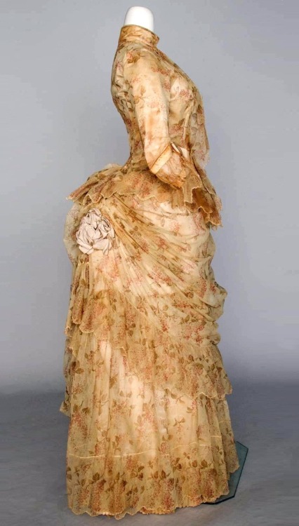 Printed tulle bustle dress, 1886. From Augusta Auctions.