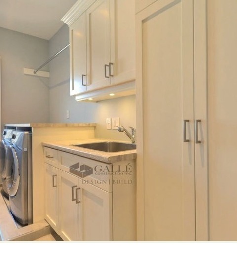 Toronto LaundryInspiration For A Sizable, Traditional Laundry Room Remodel With A Side-by-side Washer