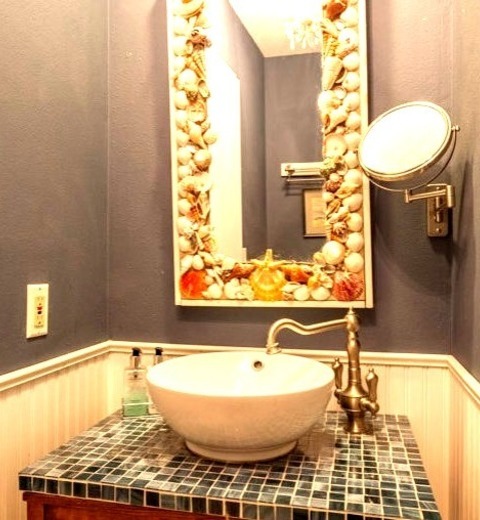 Los Angeles Powder Room Bathroom A Small Powder Room With Furniture-like Cabinets, Dark Wood Cabinets,