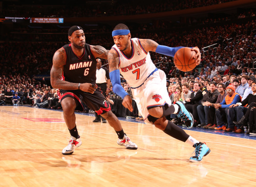 nba:  Carmelo Anthony of the New York Knicks drives against LeBron James #6 of the Miami Heat during a game at Madison Square Garden in New York City on January 9, 2014. (Photo by Nathaniel S. Butler/NBAE via Getty Images)