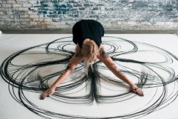 unknowneditors:  Artist Heather Hansen Emptied Gestures is as much a performance piece as it is a drawing. Appearing to use charcoal or pastel, Hansen literally steps on to the paper and begins to draw. She allows the natural movements of her body the