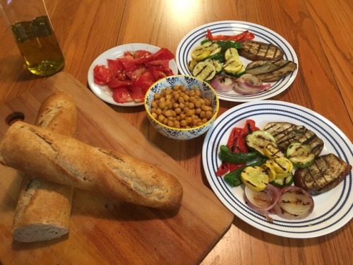 My favorite Mediterranean dinner! Roasted veggies with a whole bowl of chickpeas, tomato salad, an e