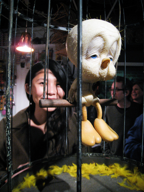 deleteyourself: We checked out Banksy’s “Village Pet Store And Charcoal Grill” after dinner the other night.  Suuuuuuuuuper cool stuff.  This is Michelle and poor Old Tweety Bird. i want to see this. jethro, go see this for me.