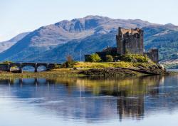 en-omgb: A journey through time Eilean Donan Castle, Kyle of Lochalsh, Scotland This beautiful 13th century castle sits at the point where 3 great sea lochs meet and provides one of the most iconic images of Scotland. Photo by Colin Roberts - More info