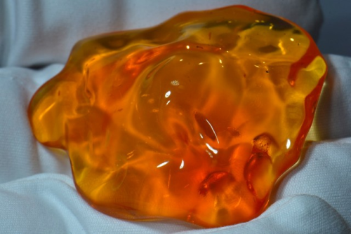 blondebrainpower:  Mexican Fire OpalThe Mexican Fire Opal is named for its brilliant red to orange body color which is partly due to iron oxide. Mined in Mexico, this opal is lighter weight than other opal. These Mexican Fire Opals tend to have one body