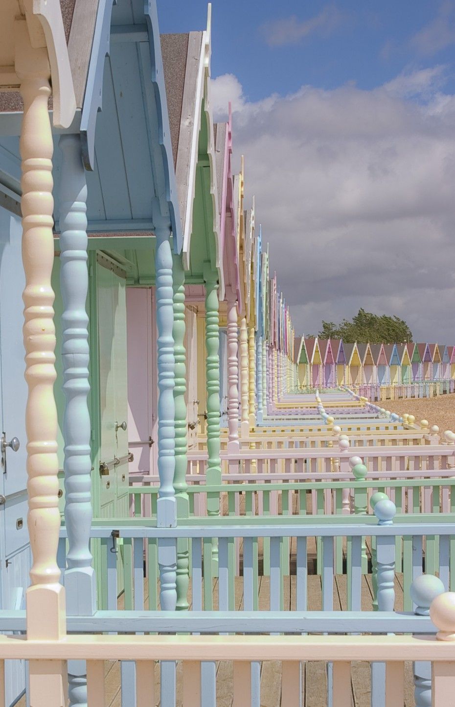 vanilla-cloudberry:  Pastel beach huts of Mersea Island, Essex Via messynessychic.com