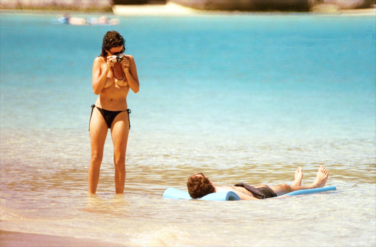toplessbeachcelebs:  Penelope Cruz (Actress) swimming topless on the beach (February