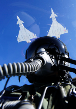 2curious2kno:  inthemilitary:  A pair of Austrian Eurofighter Typhoons seen from a cockpit of a colleague during training. Source: https://imgur.com/uA8K0ND  Looking good @flyingsheepdog 😉