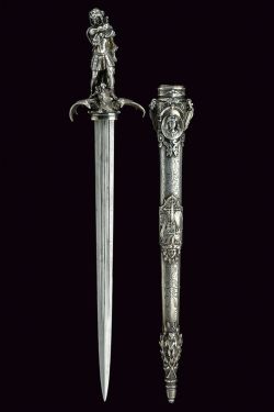 art-of-swords:  “Heroic Style” Silver Mounted DaggerDated: 19th centuryCulture: EuropeanMeasurements: height 64cmThe dagger has a straight, double-edged blade with three fullers. The massive, silver hilt has its the grip worked as the in-the-round