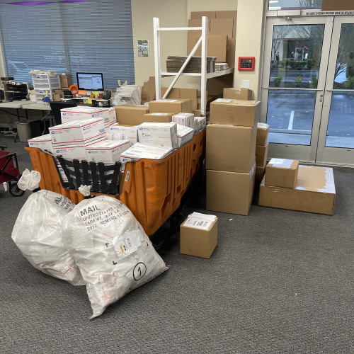 That is quite a pile of packages going out the door today (so far). Our shipping team is doing an in