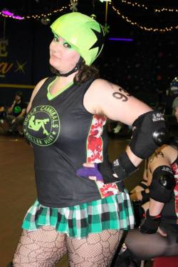 deanup:  shaebay:  Haha, my poor gimpy hand. I had it buddy taped and wrapped with another finger in purple in honor of the team we were playing. [Photo by Turborex Derby]  lovely pretty girl….  What a hot piece