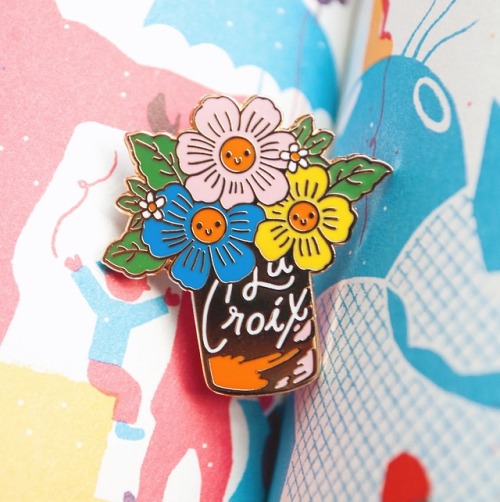 a little bouquet in a la croix can for your jean jacket