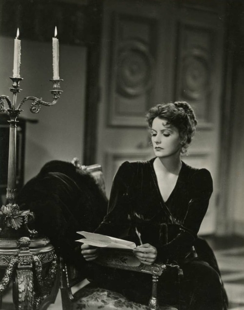 Greta Garbo, as Countess Marie Walewska, reads in Conquest, 1937. Photograph by Clare